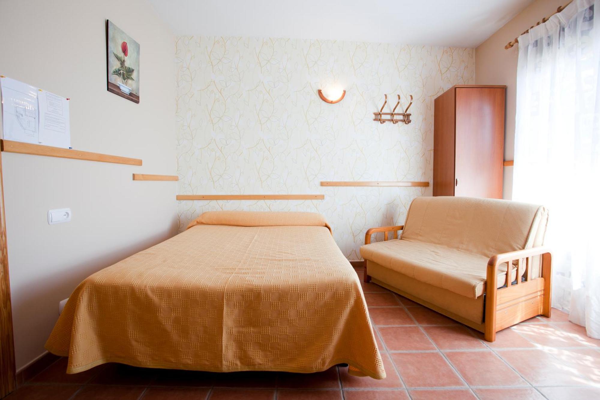 Apartamentos Rurales "La Fuentecilla" Баньос-де-Монтемайор Экстерьер фото